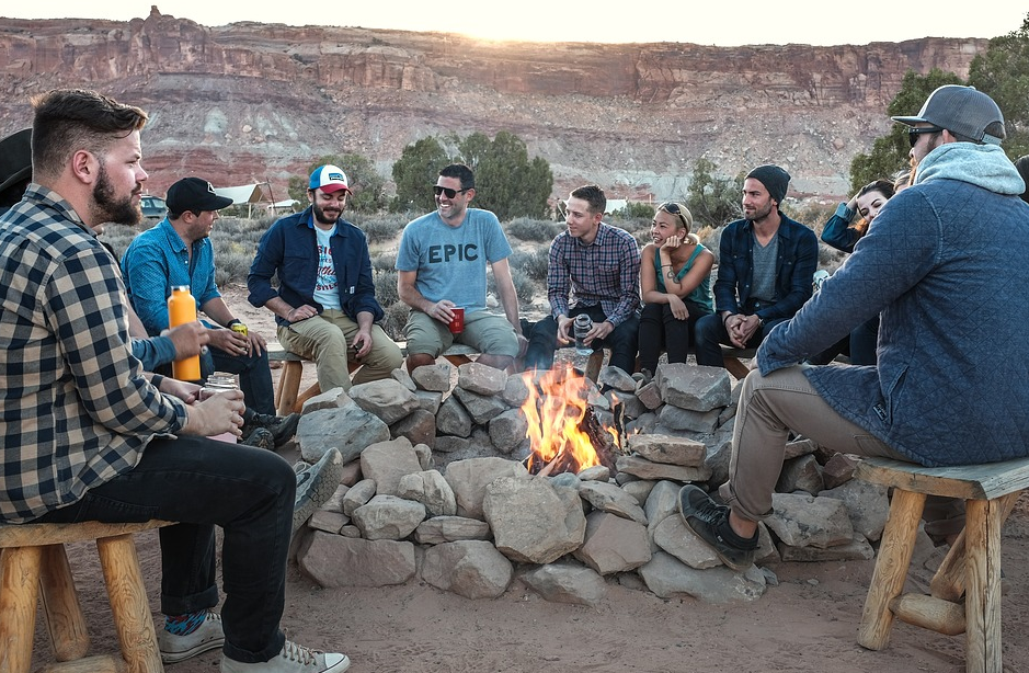 A group of people around the fire